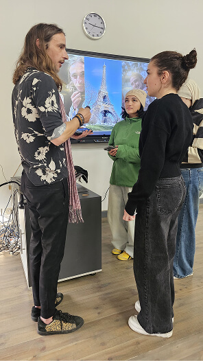BUE students reviewing Melbrins' sketchbooks